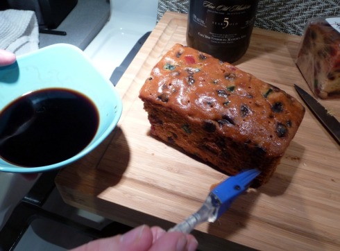 How to add rum to fruit cake